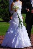 Suknia ślubna sprzedam suknię ślubną kolor: biały rozmiar: 38