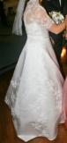 Suknia ślubna Suknia ślubna z trenem kolor: Biała rozmiar: 36-38